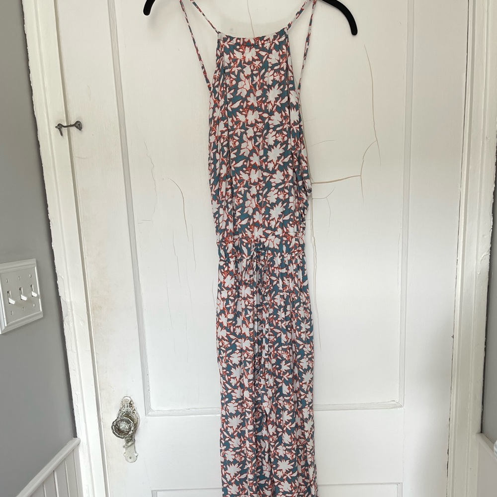 Causal jumpsuit with open back. Great for island wear.